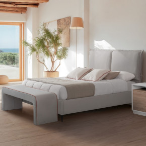 Cama canapé tapizada con patas NOMA