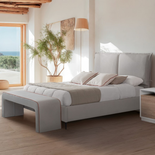 Cama canapé tapizada con patas NOMA